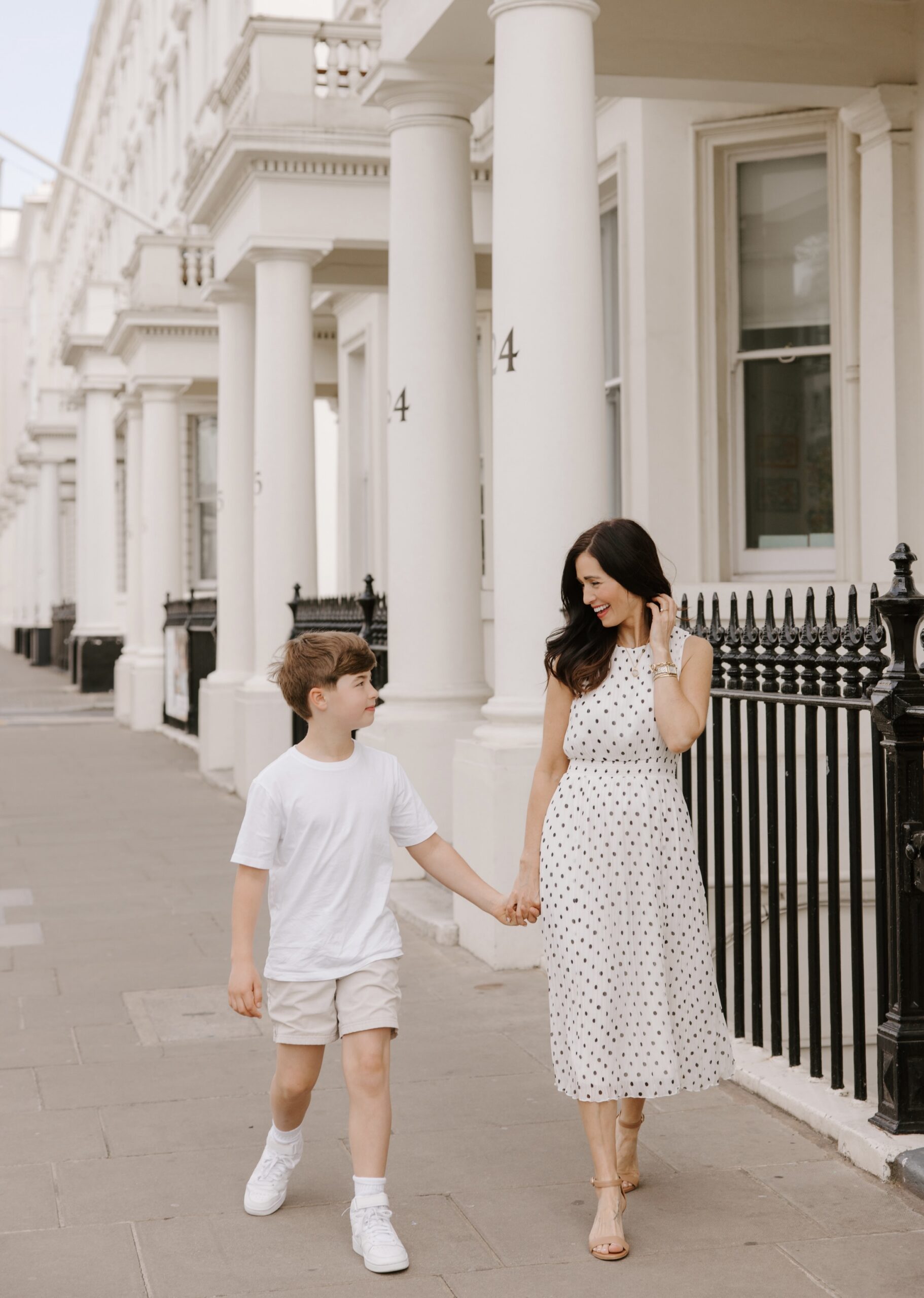 Tori and Max smiling in London street