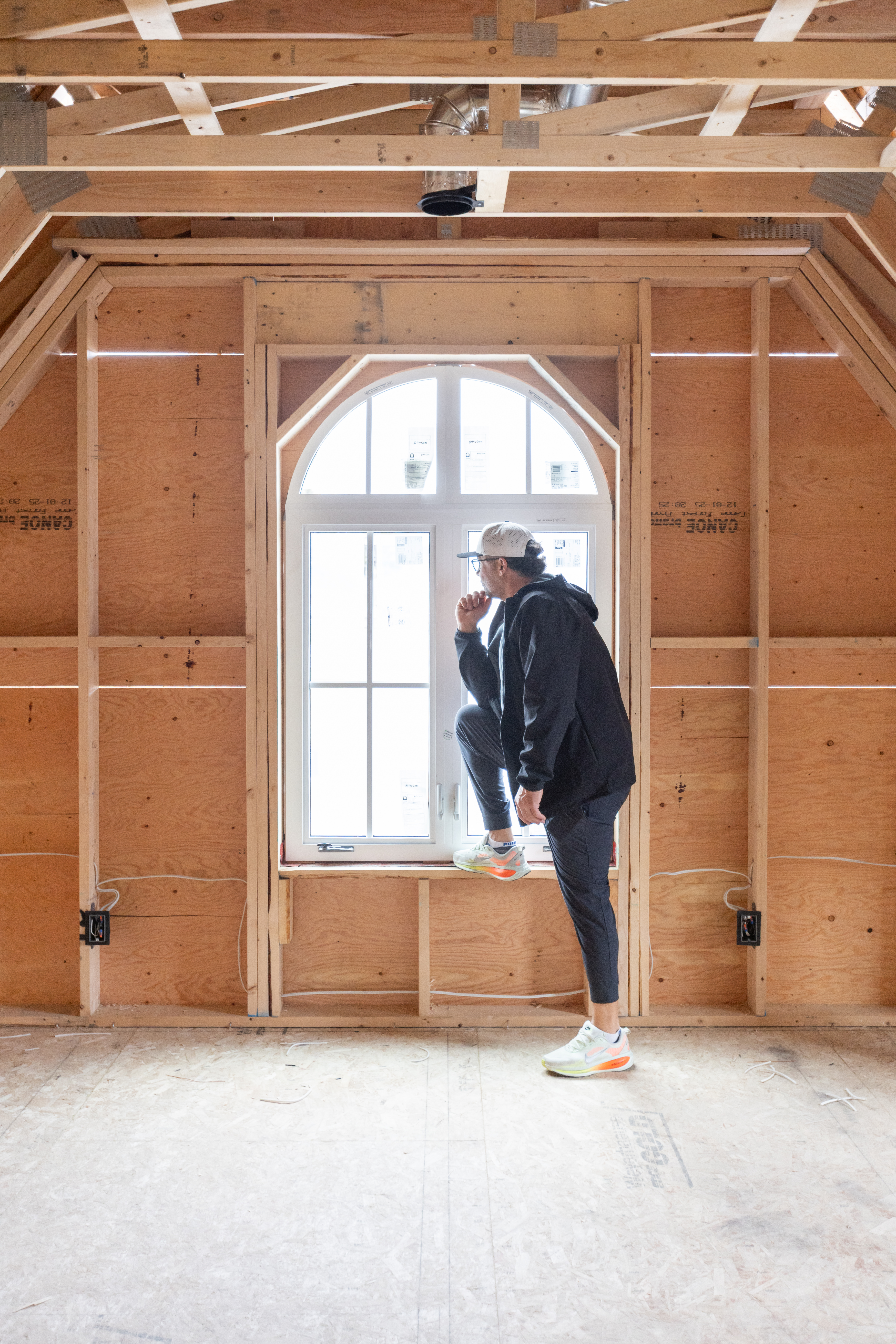 Charles, builder of this home, posing charmingly in new home